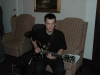 Connor Chan playing the guitar
