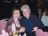 Jean Lumb and former mayor Barbara Hall seated at table smiling