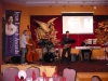 musicians on stage with standing bass, keyboard and saxophone