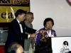 Jean Lumb speaks to Guests and Award Recipients behind podium