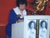 Jean Lumb speaking behind podium