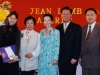 five people standing together for a photo