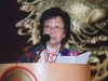Jean Lumb speaking at podium