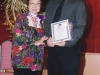 student being presented with award