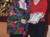 student being presented with award