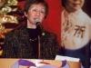 women speaking at podium