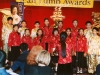 children's choir singing to guests