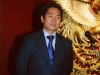 man in blue tie smiling