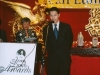 man speaking at podium