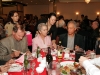 Dinner guests at the awards dinner eating at table