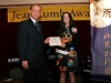 gentleman handing award to female award winner
