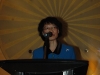 Deputy Consul General Wu Dongmei speaking to guests behind podium