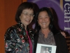 Arlene Chan handing award to event sponsor
