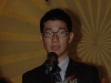 student award winner speaking into micrphone