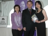 three guests standing for photo