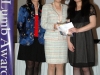 three people standing together for photo