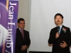 student speaking into mircrophone