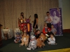 Little children dressed up in Halloween costumes .