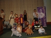Little children dressed up in Halloween costumes .