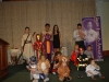 Little children dressed up in Halloween costumes .