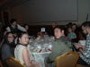 Large banquet hall with guests seated at dinner tables