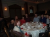 Large banquet hall with guests seated at dinner tables