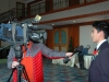 Student being interviewed by camera man.