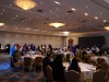 Banquet hall with dinner guests.