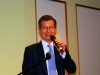 Man speaking into microphone.