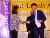 Student award winner shaking hands with Arlene Chan.
