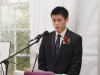 student speaking into microphone