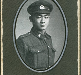 portrait of youn chinese man in military uniform