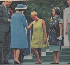Jean Lumb and others greeting Queen Elizabeth with a curtsy